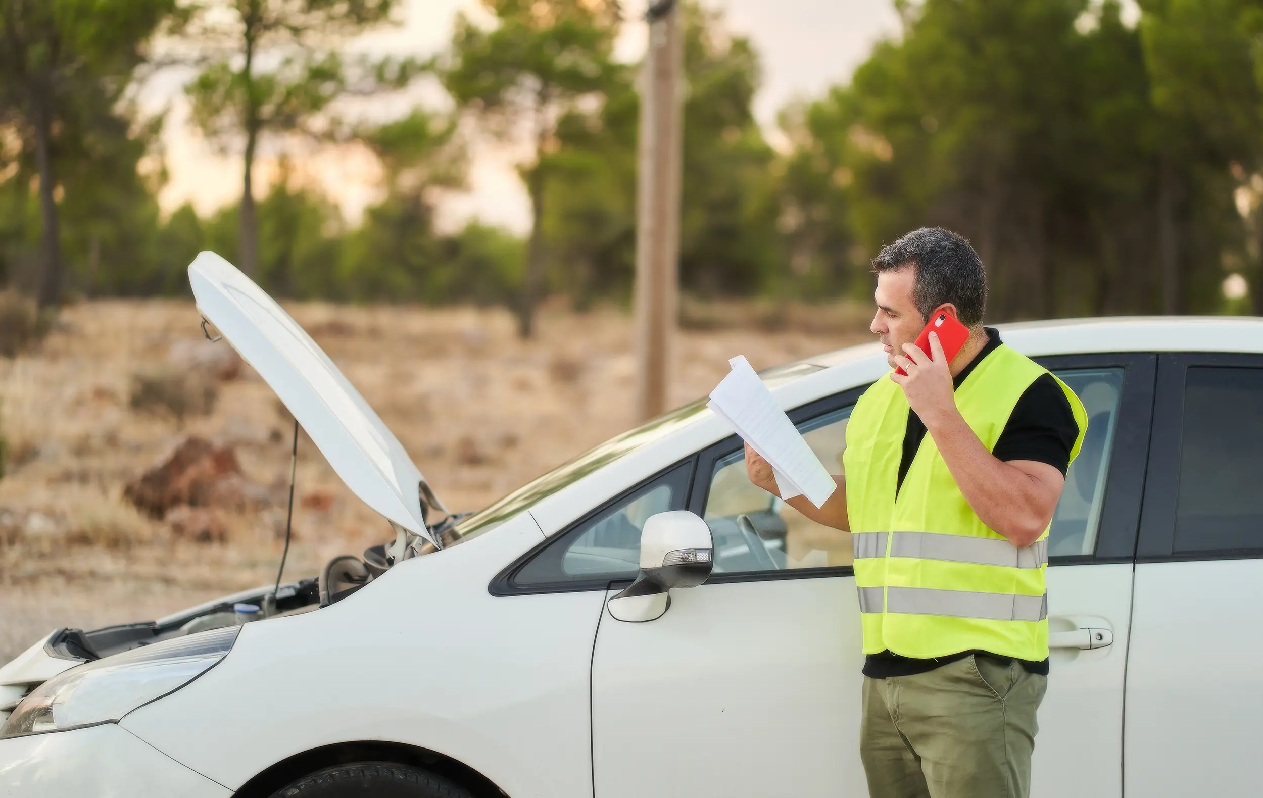 a-man-calling-the-automobile-insurance-company-to-2024-11-27-04-35-03-utc copy